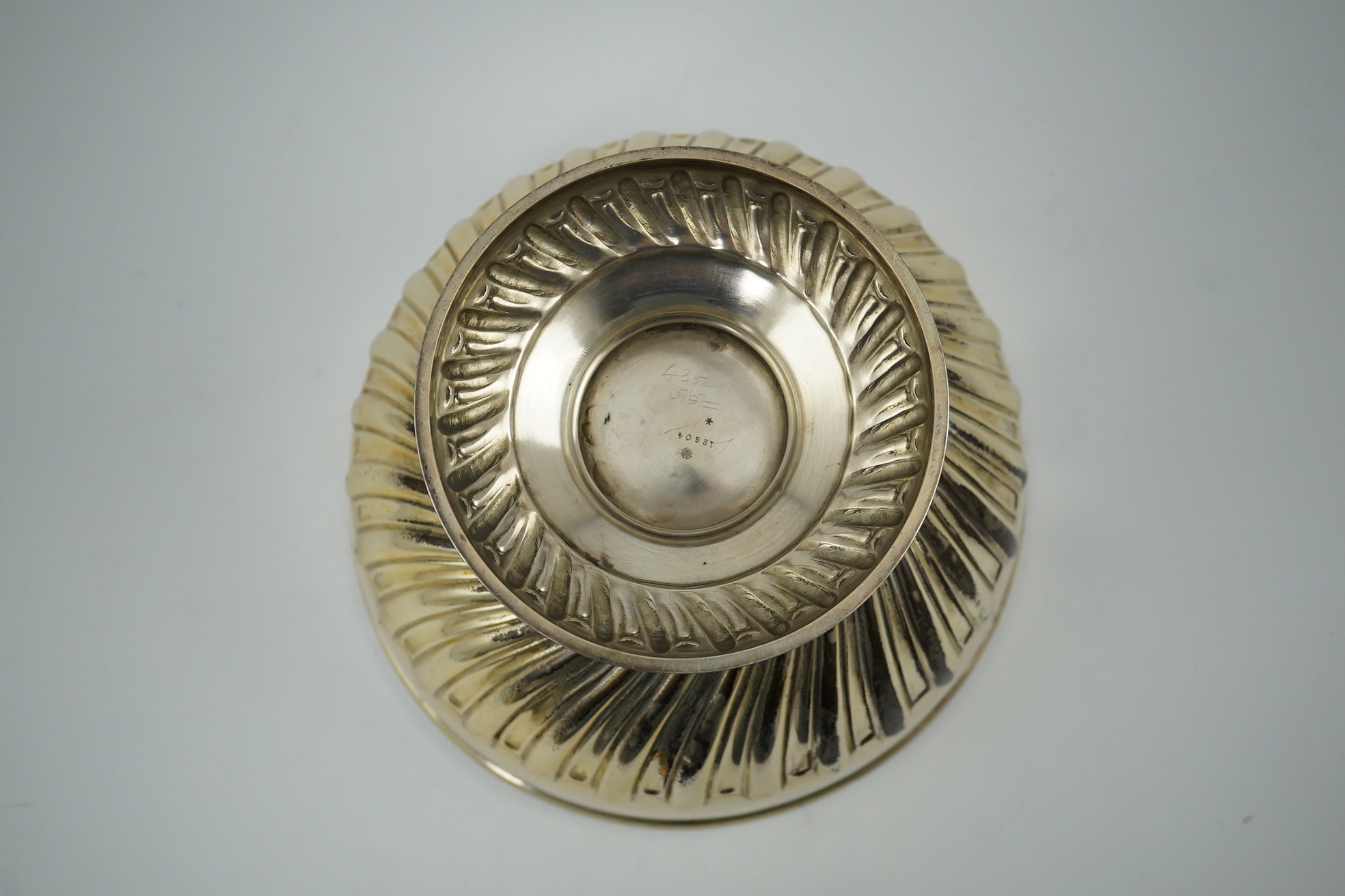 A George V demi-spiral fluted silver rose bowl by William Hutton & Sons Ltd